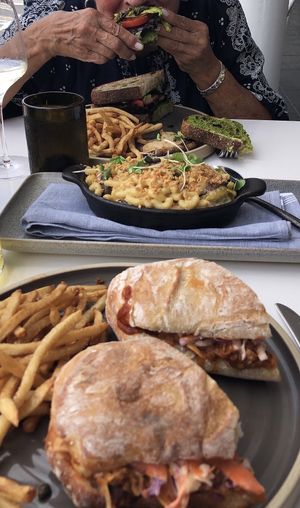 BBQ jackfruit, vegan mac, and vegan BLT (and mom enjoying it).  at Mood in Tequesta