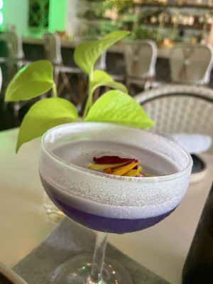 Spice mocktail (like a pina colada) separated into pretty layers    at Mood in Tequesta