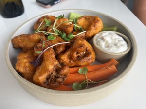 Buffalo cauliflower bites with blue cheese sauce   at Mood in Tequesta