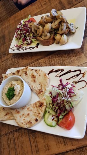 Flatbread and hummus, and garlic mushroom starters at Victoria & Albert Inn in Whitley Bay