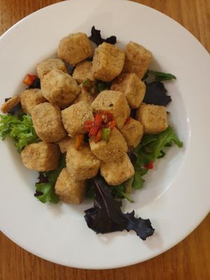 Salt and Pepper Tofu $19.00: AMAZING, perfectly seasoned and cooked, lovely soft texture inside contrasted with crispy outside at Loving Hut in Richmond