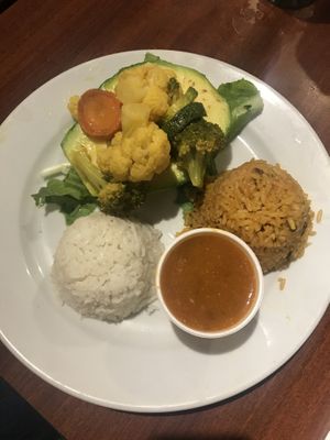 Vegetable stuffed avocado with rice and beans at Café El Punto in San Juan