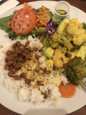 Vegetable stuffed avocado with rice and beans at Café El Punto in San Juan
