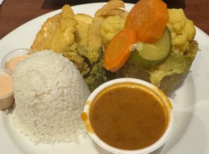 Veggie stuffed mofongo (smashed plantain) with rice and beans and tostones de pana.  at Café El Punto in San Juan