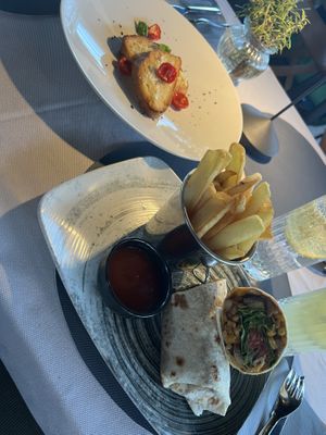 Vegan wrap with fries 14€ and garlic bread 7€  at 2Point in Trogir