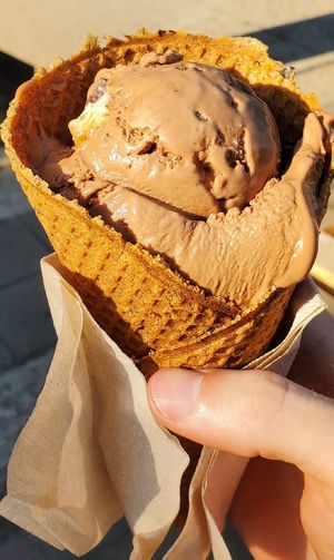 Rocky road ice cream in a waffle cone at Honey's in Toronto