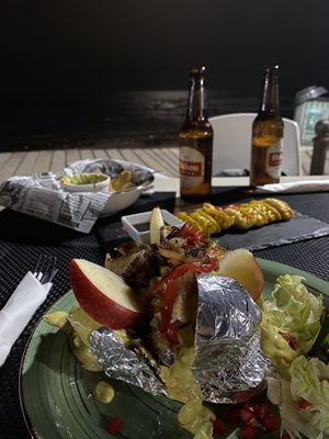 Stuffed potato, gyozas and guac nachos 😋 at Foodline in Torrevieja
