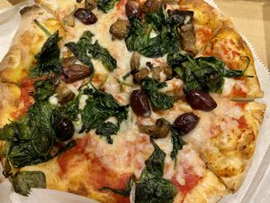 Spinach, smokey mushrooms and kalamata olives  at Comet Ping Pong in Washington