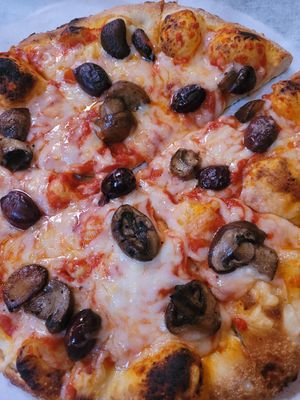 Soy cheese, Kalakaua, and mushrooms at Comet Ping Pong in Washington