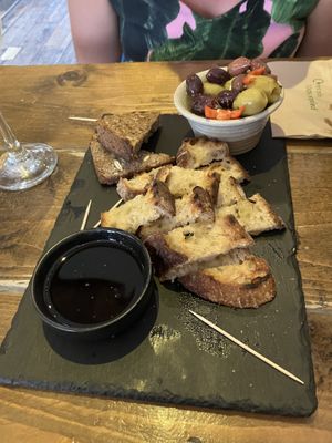 Warm breads, oil and olives  at Hoogah Cafe in Swansea