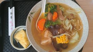 NTD180，麻油侯頭鼓麵線，sesame oil lion-head mushroom soup with thin noodles (contains egg, impossible to make vegan) at Yǒujī Dàdì 有機大地健康蔬食餐廳 in Jiaoxi