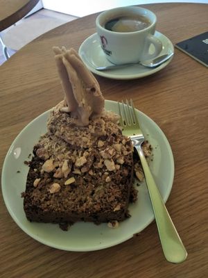 Banana bread topped with peanut ice cream. at Keep Bañana in Munich