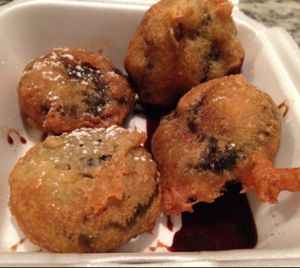 Deep Fried Oreos in chocolate sauce, & sprinkled with powdered sugar  at Doomie's Home Cookin' in Hollywood