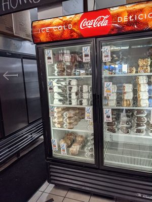 fridge with huge cakes at Doomie's Home Cookin' in Hollywood
