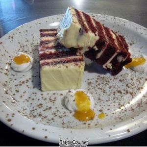 Vegan New Orleans red velvet with buttercream frosting and whipping cream at Doomie's Home Cookin' in Hollywood