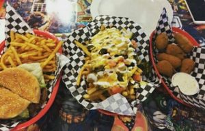 pulled pork sandwich, chilli cheez fries, jalapeno poppers at Doomie's Home Cookin' in Hollywood