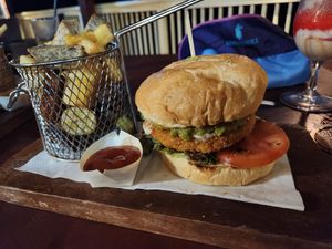 Vegan burger and island style fries at Captain Andy's Bar & Grill in Rarotonga
