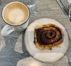 Sticky toffee cinnamon swirl with oat milk latte  at Trellis Coffee Shop in Ellon