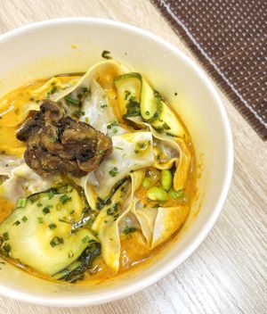 Vegan gyoza: dumplings filled with minced vegetable meat and kimchi cabbage, marinated zucchini and fried crispy oyster mushrooms at Coffee Cult - Sovetskaya in Tula