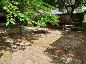 The outside sitting area of the café at Ulriksdals Trädgård Arts & Crafts in Kivik