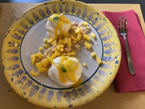 cheesecake scomposta al mango 🔝😋  at re BiO in Rome