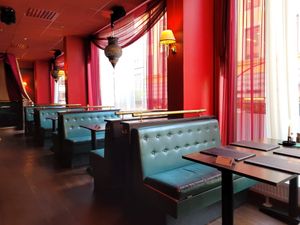 Indoor seating and decor at Habibi in Oslo