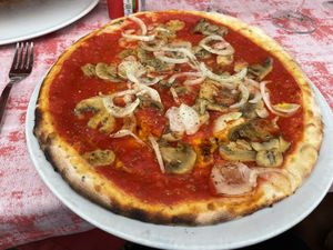 Pizza Marinara with added mushrooms and onions. at La Bellagina in Bellagio