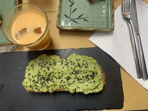 Avocado toast and juice   at Brunch Cafe in Venice