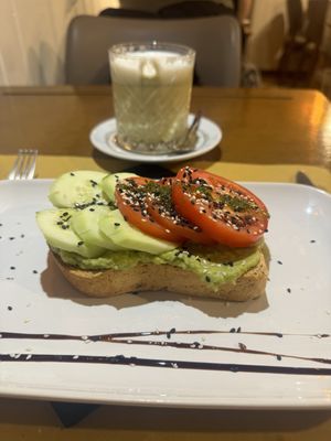 Vegan avocado toast and matcha latte with soy milkk  at Brunch Cafe in Venice