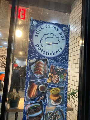Window sign at Stick To My Pot in New York City
