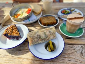 Chai Latte with oat milk, Vegan Chickpea and Kale Burrito, Blueberry Crumble  at Smitten in Bakersfield