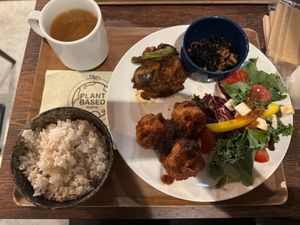 4 Types of plate feat: (A) Fried egg plant w/spicy soy meat, (B) Soy meat fried chicken, rice w/mixed grains&soup at Plant Based Tokyo in Tokyo