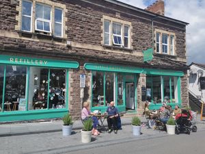 Outdoor and indoor seating. at Little Green Refills in Abergavenny