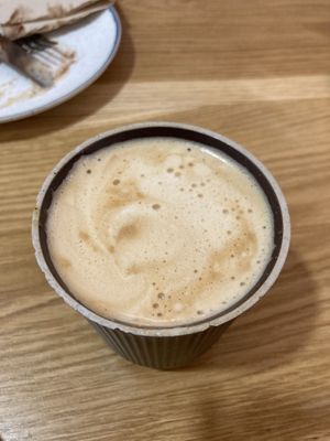 Pistachio latte  at Delish Vegan Doughnuts - Malasaña in Madrid