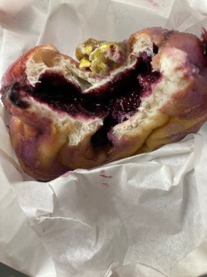 Stuffing of their blueberry lavender flavor 🤤  at Delish Vegan Doughnuts - Malasaña in Madrid