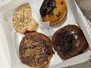Kinder Bueno, PB&jelly, mocha and spicy cream cheese. at Delish Vegan Doughnuts - Malasaña in Madrid