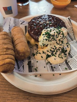 Korean burger on a waffle and homemade tequeños at FinaFilipina in Madrid