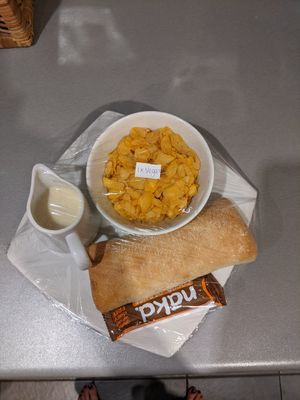 Continental breakfast provided for overnight guests. Cornflakes, unlabelled milk, plain ciabatta bread, Nakd bar at Titanic Spa in Huddersfield