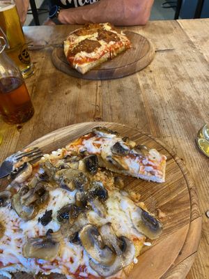 Funghi pizza near, Diavolo far  at Vegitalian in Salzburg