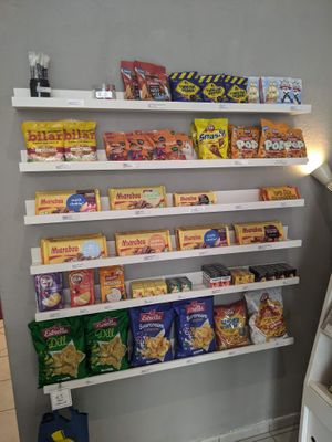 Chocolate, bags and chips at Herr Nilsson GODIS in Berlin