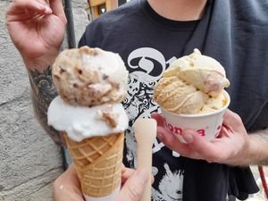Meringue and snickers in the cone.creme catalan,salted caramel&espanol in the cup at Madonna Gelateri in Girona