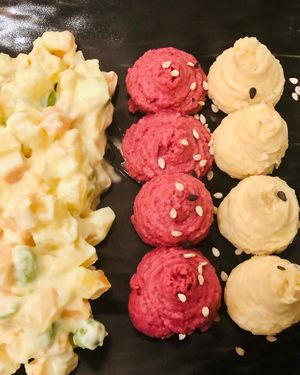 Russian salad, beetroot hummus, chickpea hummus   at Idem Con Patate in Turin