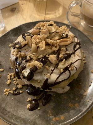 Pancake con arachidi caramello salato cioccolato cannella banana e nocciole   at Idem Con Patate in Turin