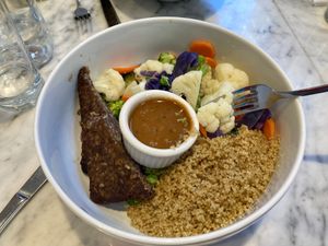 Bowl with quinoa, tempeh, and veggies at Spring Cafe Aspen in New York City