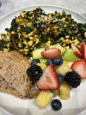 Green tofu scramble with multigrain toast and fruit   at Spring Cafe Aspen in New York City
