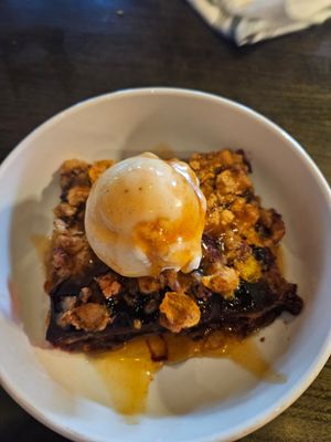 Concord grape crumble with vegan vanilla ice cream at Hollerhorn Distilling in Naples