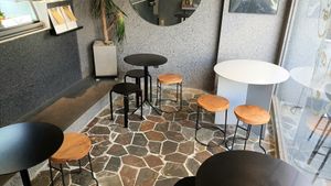 interior of location - seating: only 4 tables indoors at Monk's Deli in Seoul