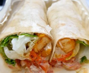 chickn ceasar wrap delivered. at Monk's Deli in Seoul