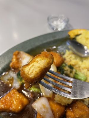 Orange chicken tofu 
Tofu close-up  at Monk's Deli in Seoul