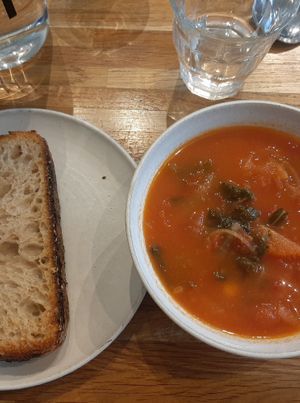 Delicious tomatoe soup with chickpeas and cale, (ordered without butter on bread to make it vegan) at Birch in Isle Of Skye